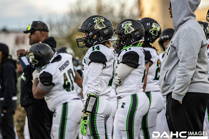 Phantomz players gather on the sideline